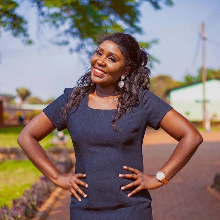 Kaveri Mehta, Lead Design Curator at MendThreadWander, reviewing corporate floral arrangements